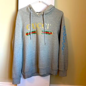 Classic gray Gucci dragon embroidered hoodie.
